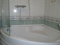 Corner bath and glass screen Corner bath and glass screen