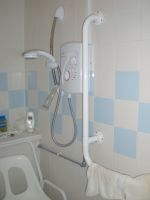 Disabled shower with rails and seat Disabled shower with rails and seat